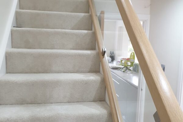 Interior staircase with laminated glass handrail