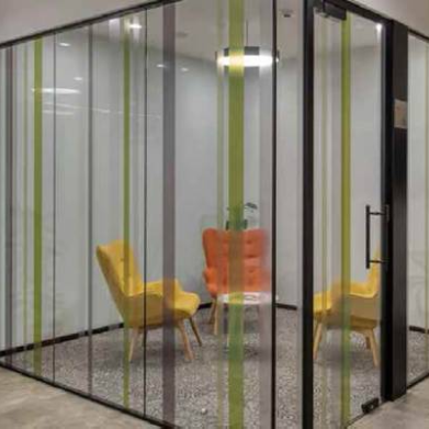 Slimline glass office partitions with minimal aluminium frames UK